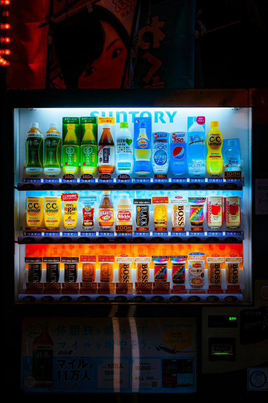 Assorted drinks inside a vending machine